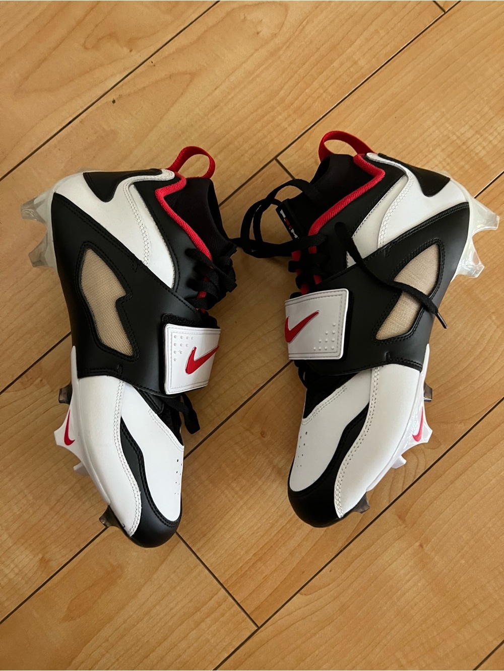 Nike Kids' Black & White Football Cleats with Red Accents